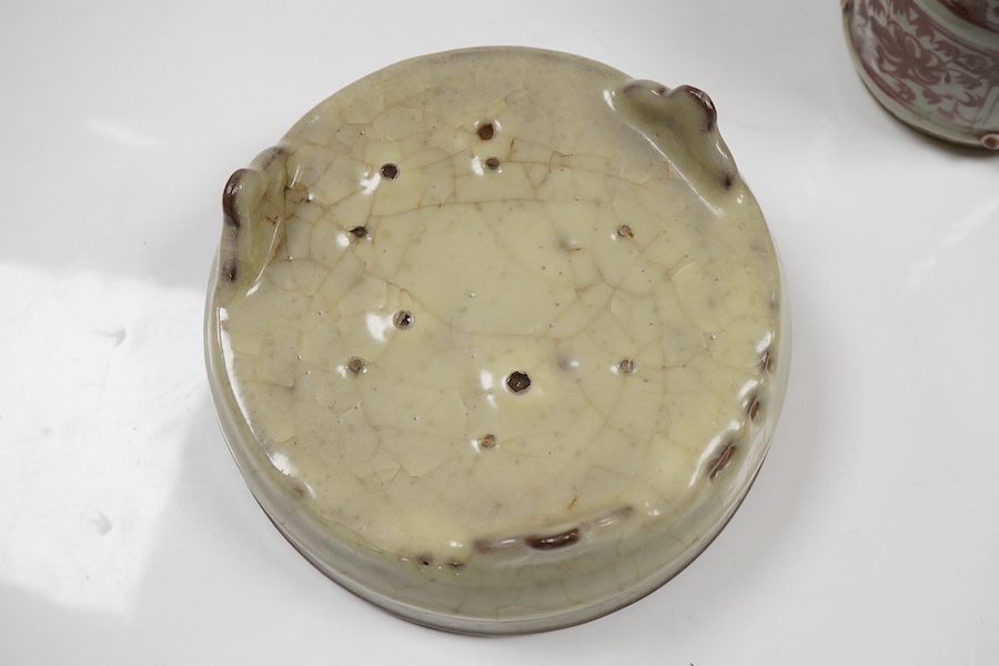 A Chinese underglaze copper red ewer and cover and a crackle glaze tripod dish, 17.5cm high